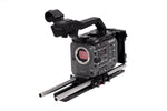 Load image into Gallery viewer, Wooden Camera Sony FX6 Unified Accessory Kit Pro with Gold Mount plate, showing top plate, baseplate, 15mm rods, and dovetail fully assembled on a camera.