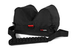 Load image into Gallery viewer, Adicam C+Saddle professional camera support bag in black Cordura, shown supporting a cinema camera for a low-angle shot.