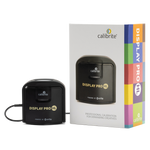 Load image into Gallery viewer, Calibrite ColorChecker Display Pro HL monitor calibration tool resting on a professional-grade computer display.