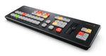 Load image into Gallery viewer, Front view of the Blackmagic Design ATEM Micro Panel, showing its two rows of backlit crosspoint buttons, keyer and transition controls, and a manual fader.