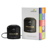 Load image into Gallery viewer, The Calibrite Display Pro HL monitor calibration device, a small puck-shaped sensor with a USB cable.