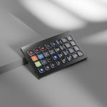 Load image into Gallery viewer, Elgato Stream Deck Module 32, an unbranded black keypad with a 4x8 grid of 32 square customizable LCD keys.