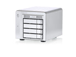Load image into Gallery viewer, Promise Pegasus M4 8TB 4-bay SSD RAID system shown on a clean desktop, highlighting its compact size next to a laptop.