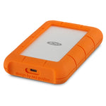 Load image into Gallery viewer, LaCie Rugged USB-C portable external hard drive with its signature orange rubber bumper and a USB-C cable.