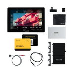 Load image into Gallery viewer, SmallHD Cine 7 RED Kit, showing the 7-inch monitor with sunhood, cables, and a Sony L-Series battery plate.
