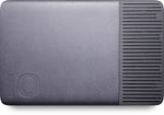 Load image into Gallery viewer, The sleek, silver iodyne Pro Data Thunderbolt 3 NVMe SSD RAID storage unit, shown in a professional studio setting.
