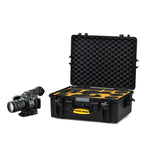 Load image into Gallery viewer, HPRC 2600 hard case open, showing the custom-cut foam interior with yellow overlay, designed to hold a Canon C100 camera, lenses, and accessories.