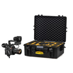 Load image into Gallery viewer, Open HPRC 2600 hard case with custom-cut foam interior, showing a Canon EOS C200 camera, lenses, and accessories neatly arranged inside.