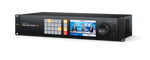Load image into Gallery viewer, Front panel of the Blackmagic Videohub 40x40 12G video router, showing the full HD LCD screen, illuminated routing buttons, and large spin knob control.