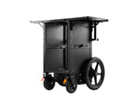 Load image into Gallery viewer, Front three-quarter view of the Inovativ Deploy Gen IV mobile DIT workstation, fully assembled on its wheels with side wings extended.