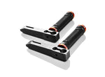 Load image into Gallery viewer, A pair of black Inovativ Dolly Handles with ODI Ruffian grips, mounted on the side of an Inovativ professional film cart.