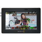Load image into Gallery viewer, Blackmagic Design Video Assist 5 inch 3G model, showing the bright touchscreen display with waveform scopes overlaid on a video feed.