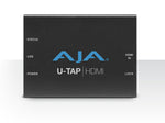 Load image into Gallery viewer, AJA U-TAP HDMI compact video capture device showing the HDMI input port and the USB 3.0 output port on its rugged metal chassis.