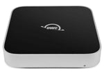 Load image into Gallery viewer, OWC miniStack external hard drive stacked neatly on top of an Apple Mac mini on a clean desk.