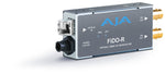 Load image into Gallery viewer, AJA FiDO Fiber Mini-Converter, a compact black device for video signal conversion.
