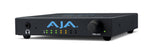 Load image into Gallery viewer, AJA T-TAP Pro, a compact black box with Thunderbolt 3, 12G-SDI, and HDMI 2.0 ports for professional 4K video output and monitoring.
