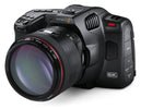 Load image into Gallery viewer, Front view of the Blackmagic Design Pocket Cinema Camera 6K Pro with its 5-inch screen and EF lens mount visible.

