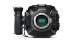 Load image into Gallery viewer, Blackmagic Design URSA Mini Pro EF Mount, a circular metal lens adapter for attaching Canon EF lenses to an URSA Mini Pro camera.
