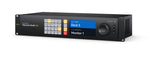 Load image into Gallery viewer, Front view of the Blackmagic Design Videohub 40x40 12G video router, showing its large LCD screen, spin knob, and input selection buttons.
