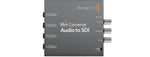 Load image into Gallery viewer, Front view of the Blackmagic Design Mini Converter - Audio to SDI 2, showing its compact metal chassis and connection labels.
