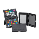 Load image into Gallery viewer, The Calibrite ColorChecker Passport Photo 2, an open, pocket-sized case showing the 24-patch color target and grey/white balance cards.
