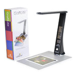 Load image into Gallery viewer, The Calibrite GrafiLite, a professional desk lamp for color assessment, shown with its neutral grey viewing mat.
