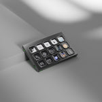 Load image into Gallery viewer, Elgato Stream Deck Module 15, an unbranded rectangular keypad with a 3x5 grid of 15 square LCD keys, shown on a neutral background.
