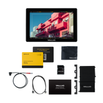 Load image into Gallery viewer, SmallHD Cine 7 on-camera monitor kit, including the 7-inch monitor, a sunhood, a Sony L-series battery plate, and cables.
